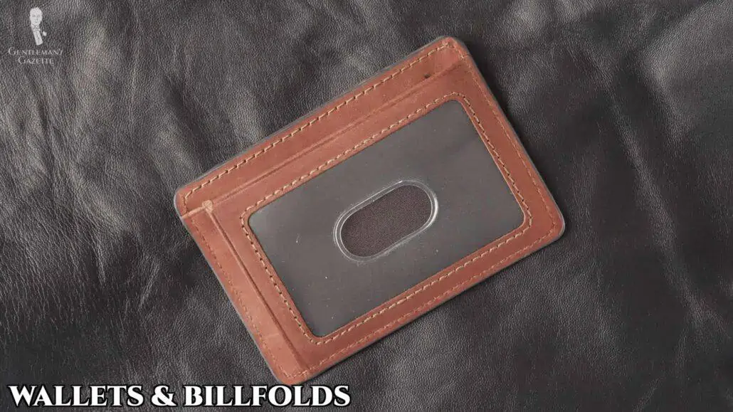 A billfold repurposed as a business cardholder.