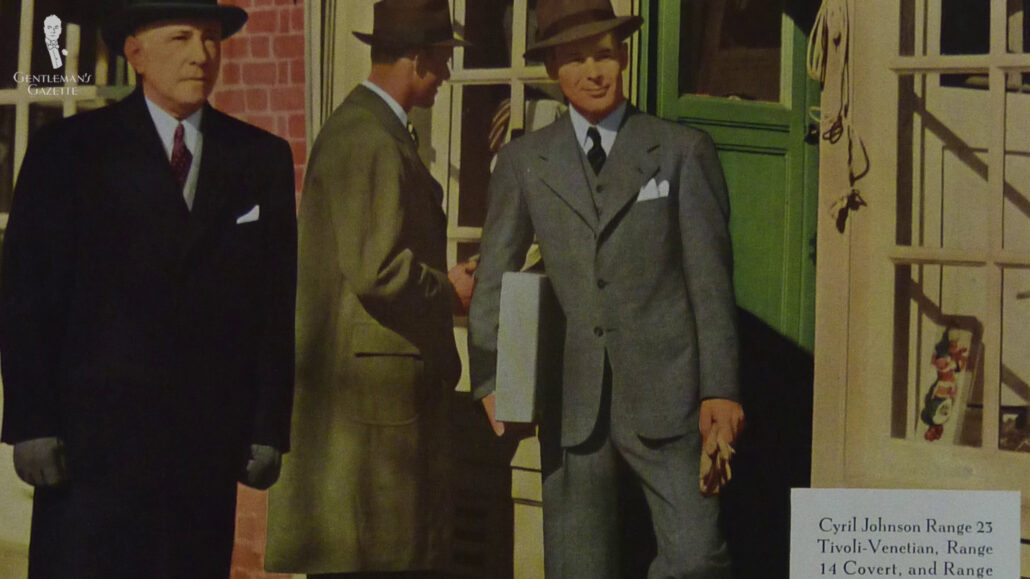 A gentleman wearing a more boxy suit that was the popular suit silhouette in the 1940s.