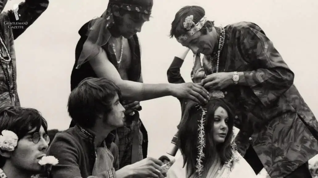 A group of hippies wearing scarves as headwear.