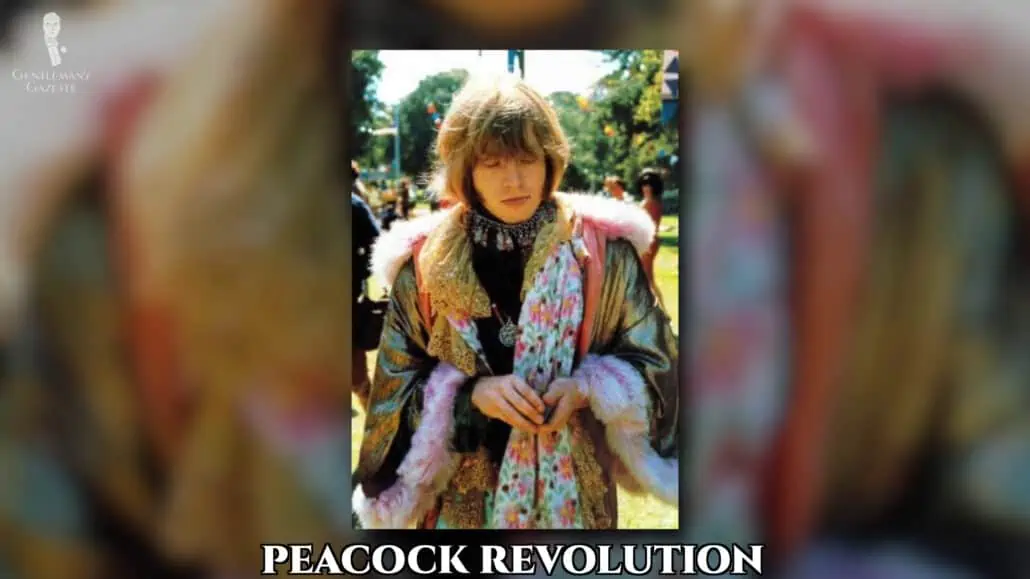 A young man wearing a peacock revolution inspired outfit.