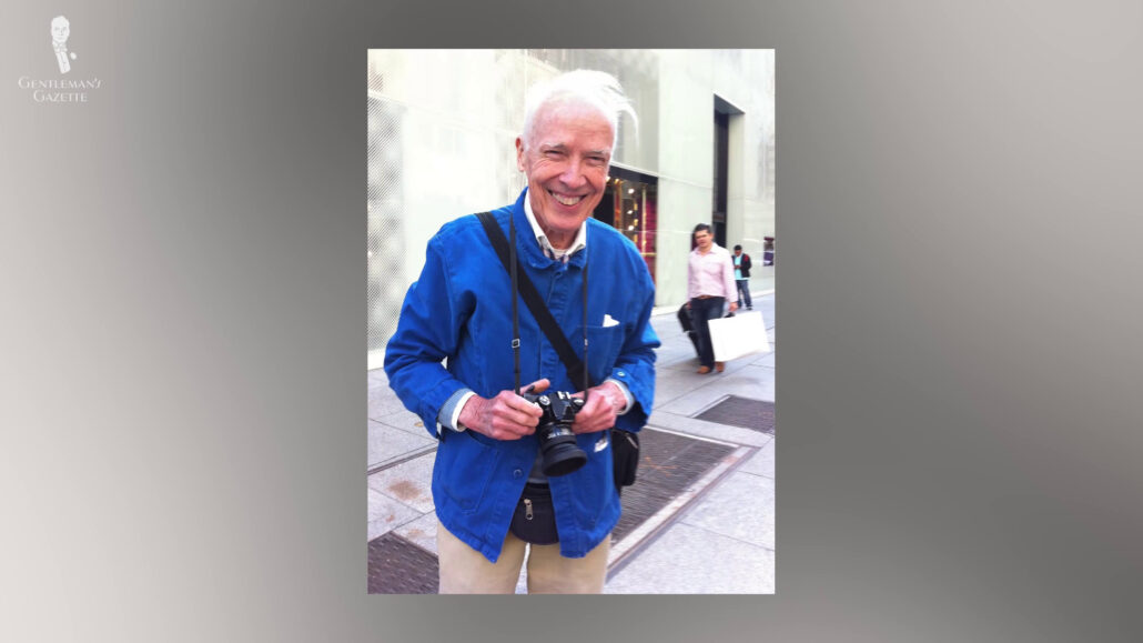 Bill Cunningham out on duty, wearing his favorite royal blue overshirt