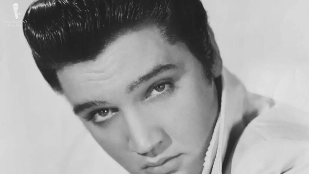 Elvis sporting a pompadour hairstyle.