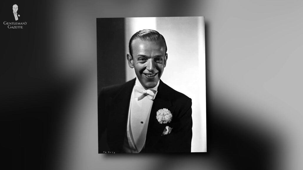 Fred Astaire all smiles in his white tie ensemble
