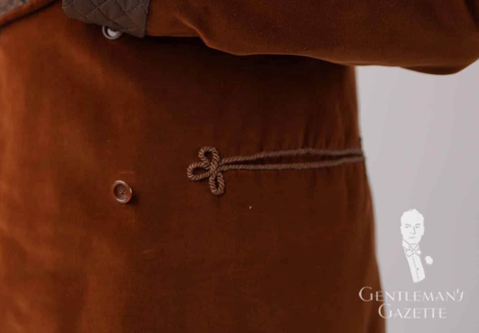 Frog Detailing On A Smoking Jacket Slit Pocket. Frog detailing on a smoking jacket slit pocket.