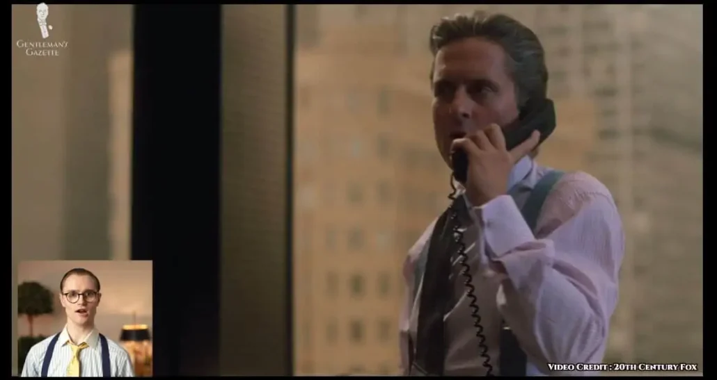 Gekko in a pair of cerulean suspenders.