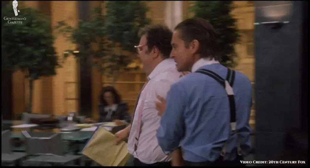 Ollie in a pink dress shirt and a matching pair of pink suspenders