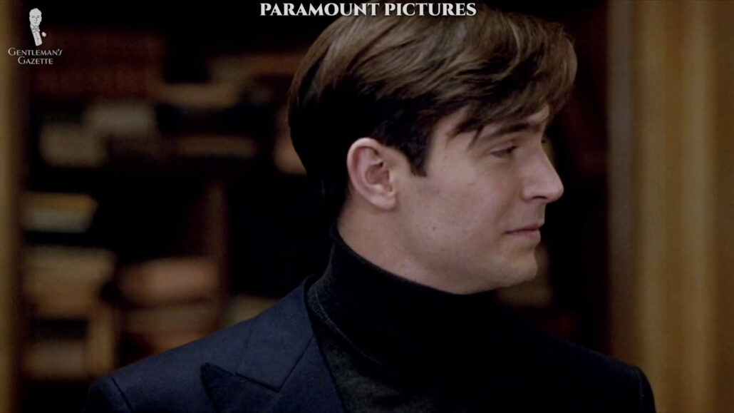 Peter wearing a dark turtle neck paired with what seems like a double-breasted jacket.