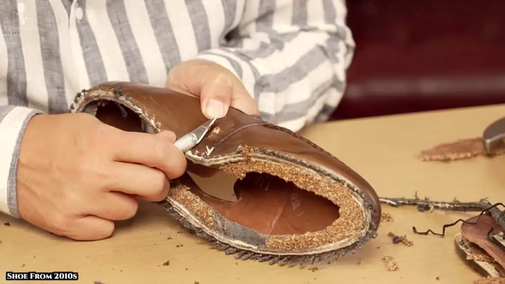 Scraping of the upper leather helps to show that it isn't aniline-dyed.
