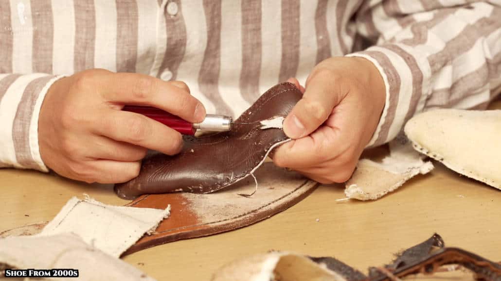 The leather of the 2000s Allen Edmonds shoe scuffs up easily