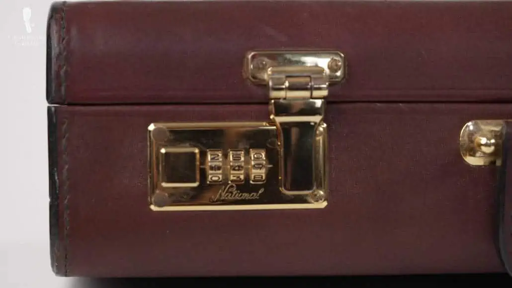 Solid brass locks on an attaché case.