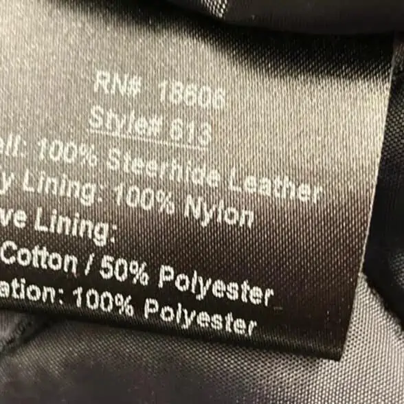 A photo of a Tag of a Mode-316 showing the materials used on the jacket.