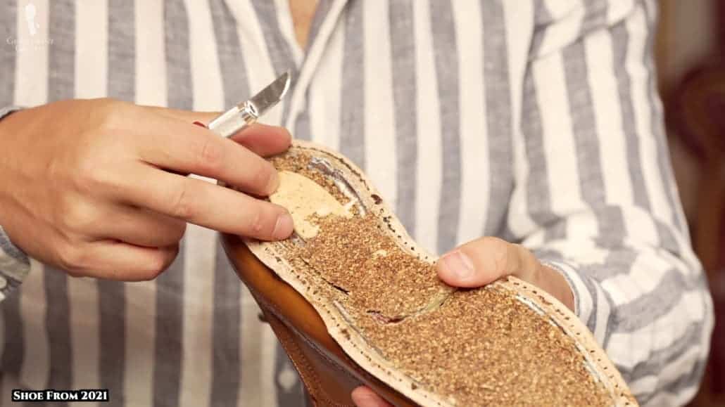 The wooden shank was placed a bit too far back in this 2010s-era shoe.