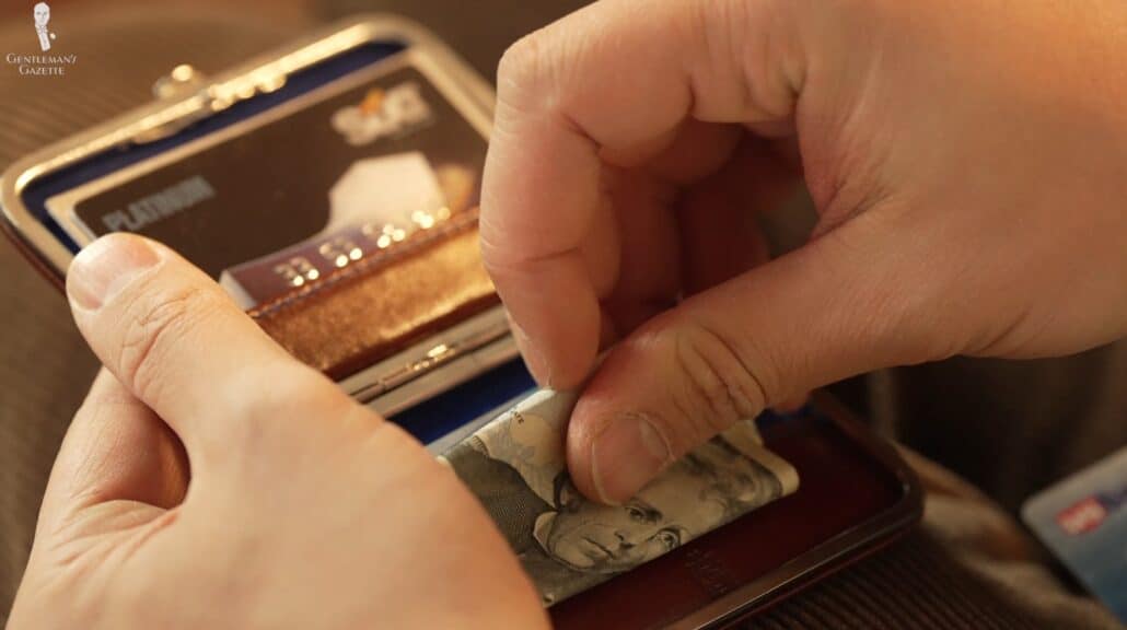 A Fort Belvedere business card case used as a wallet.