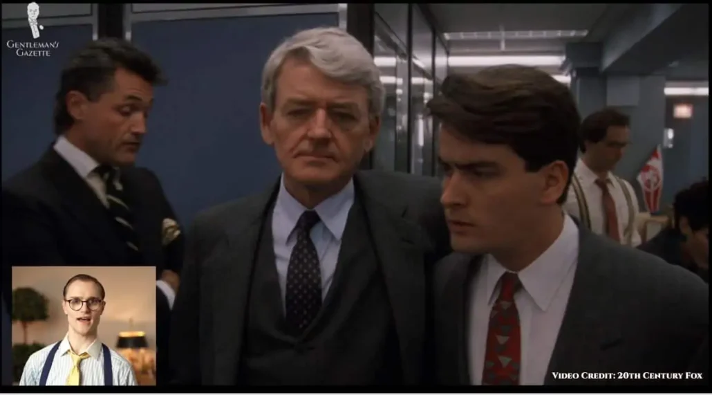 Here, Fox wears a red tie with blue-colored triangle patterns.