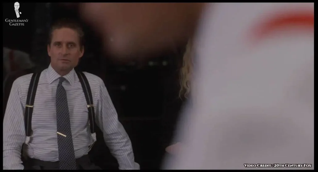 Gekko frequently wears a tie bar or tie clip, which is commonly worn at an angle