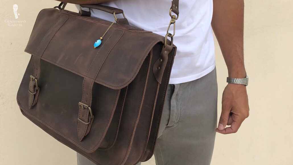 A brown, leather messenger bag.