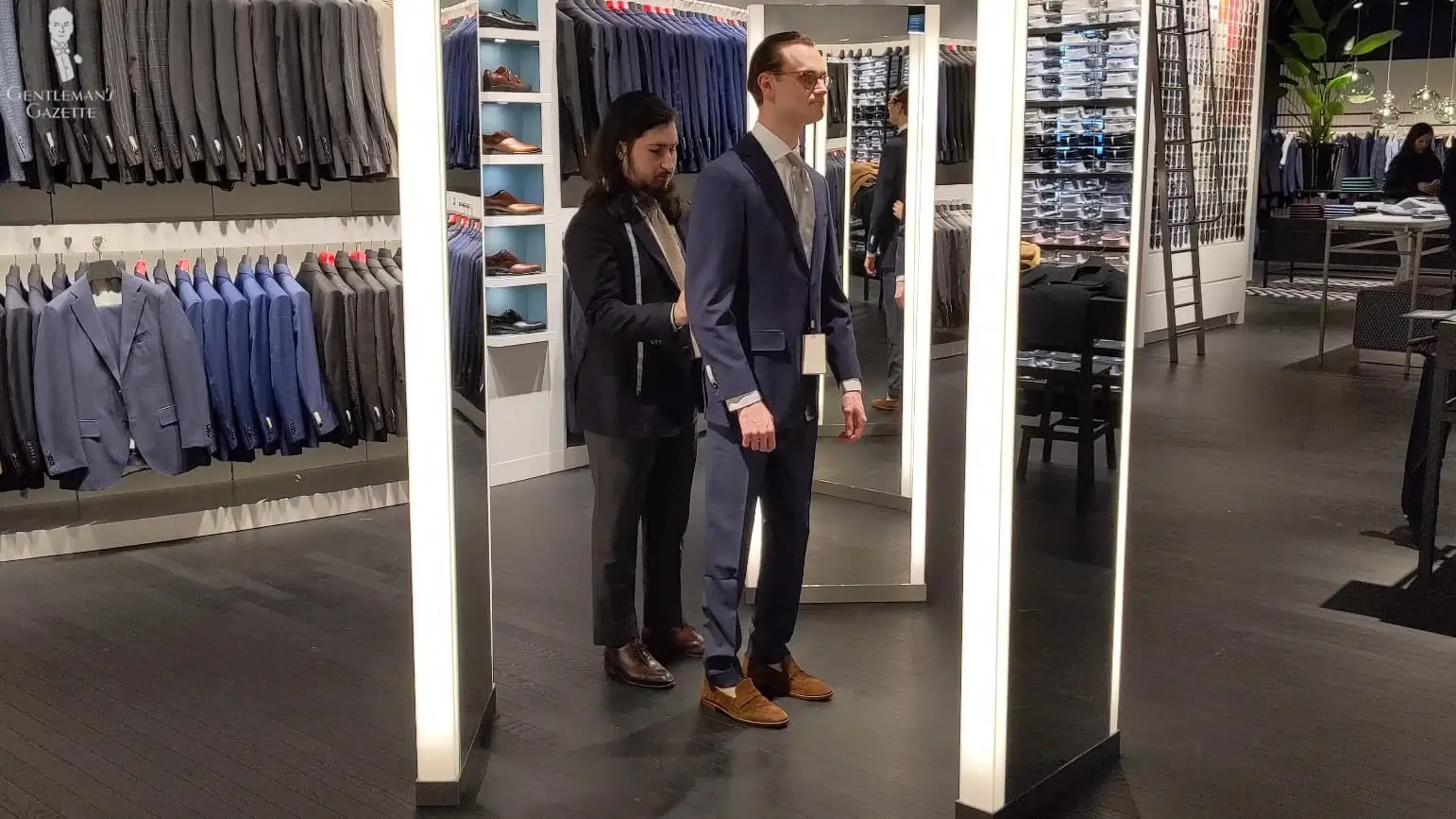 Preston fitting his made-to-measure SuitSupply suit in-store.