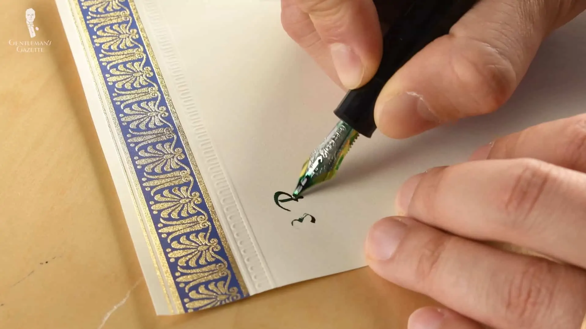 Raphael writing using a fountain pen