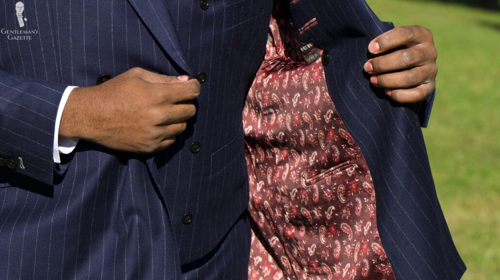 Kyle's custom suit has a paisley-patterned lining