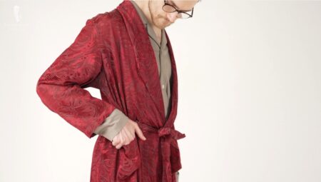 Preston in a khaki pajama set and a vintage burgundy silk dressing gown