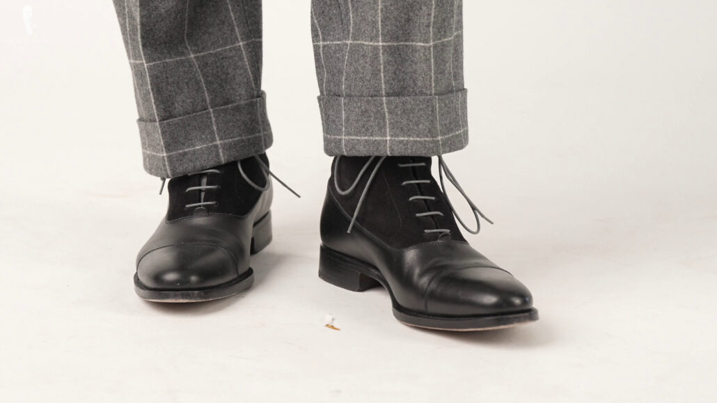Raphael paired this look with a black suede Balmoral boots. His light gray round shoelaces are from Fort Belvedere.