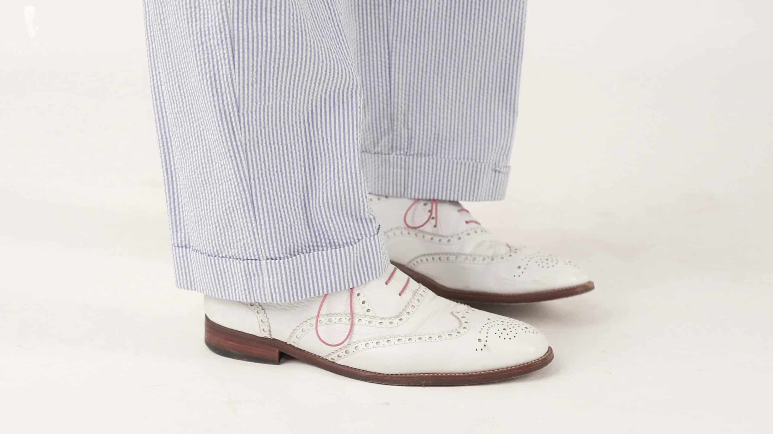 Raphael paired this look with white buckskin Oxfords.