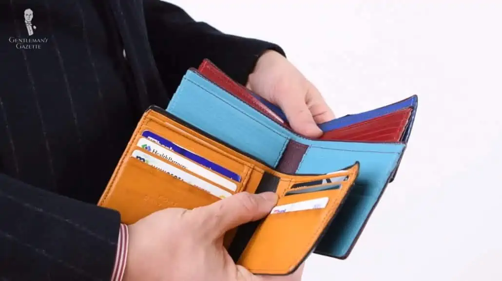 Raphael's prototype wallet alongside current Fort Belvedere wallet models