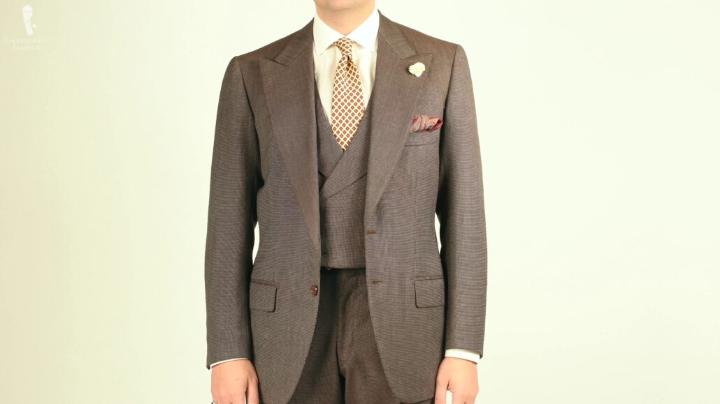 The original ensemble of Raphael's brown suit.