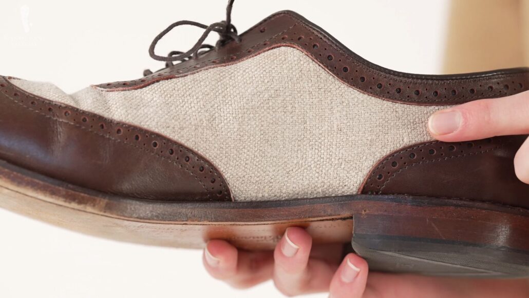 Preston shows the canvas material of the spectator shoe