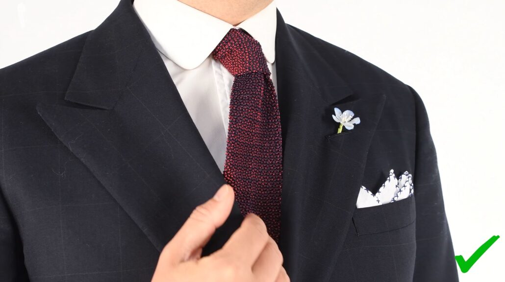 You may wear a knit tie to elevate a traditional business suit ensemble