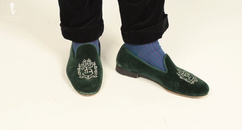 Raphael's green velvet slippers paired with Teal and Purple Shadow Stripe Ribbed Socks from Fort Belvedere