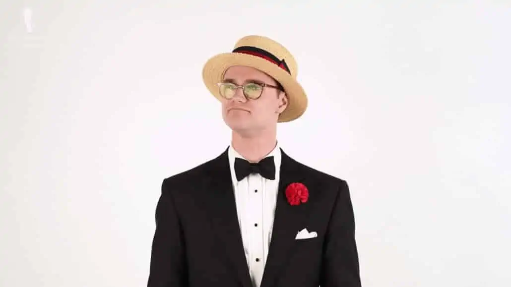 Preston wearing a straw boater to complete his black-tie look