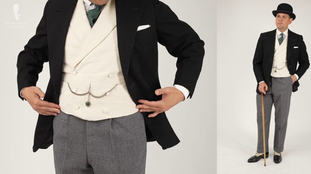 Raphael wearing a black suit jacket, an off-white vest, gray trousers, button boots, and a black bowler hat.