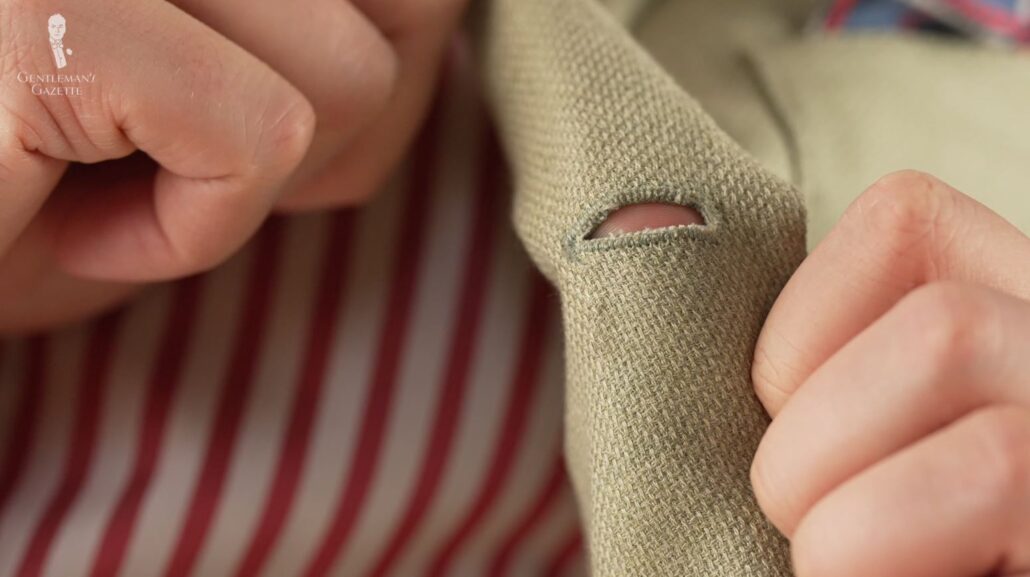 This lapel buttonhole on an Isaia sport coat is also hand-stitched