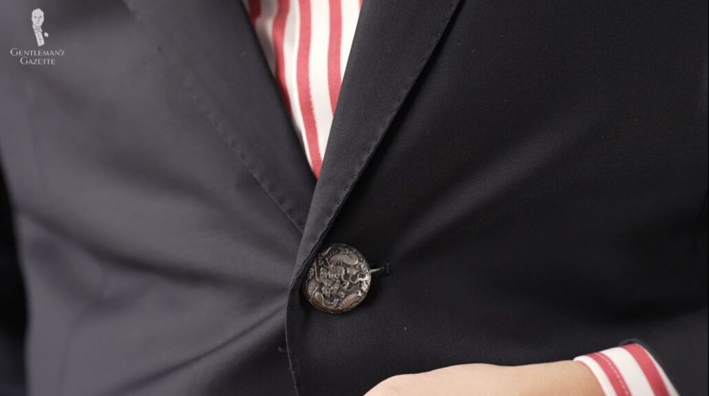 Raphael added his own pewter button to his Isaia Aquaspider blazer