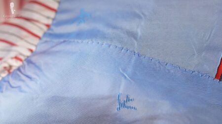 Irregular stitching on an Isaia jacket’s sleeve lining