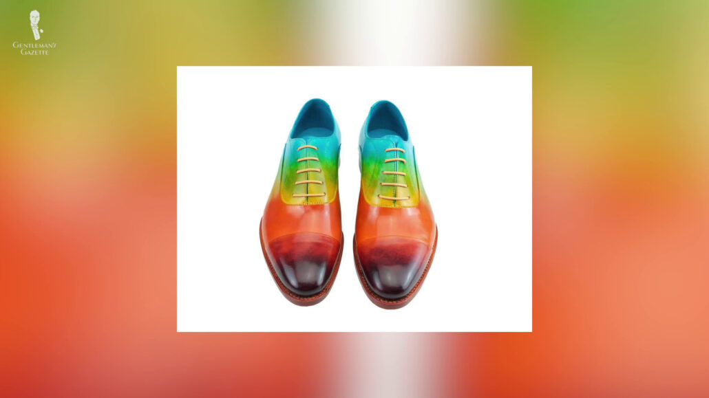 A leather dress shoe with a rainbow patina.