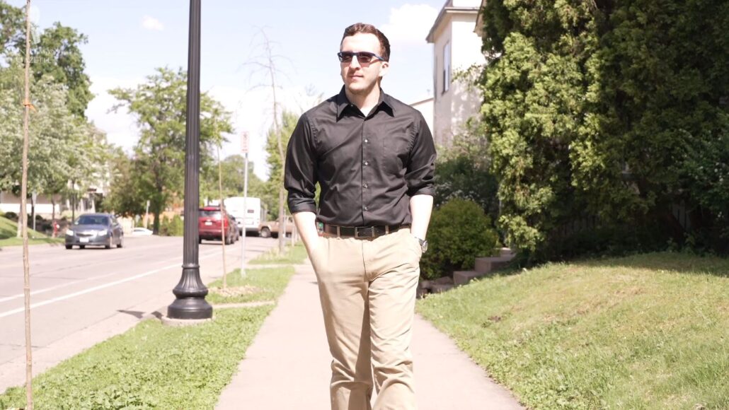 Chris in a modern casual look featuring a black dress shirt