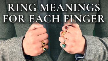 A close-up image of Raphael's hands, sporting numerous rings on most fingers; text reads, "Ring Meanings for Each Finger"