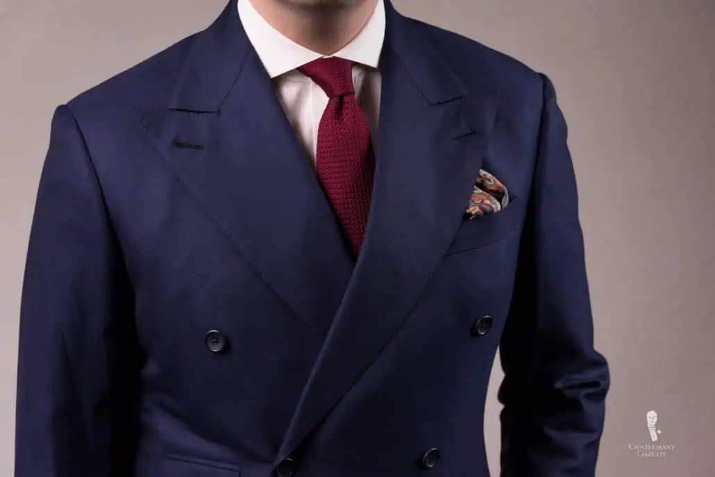 A navy suit will be more versatile than a black one.