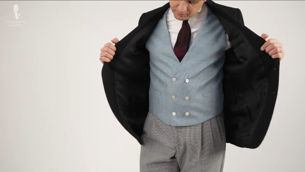 Raphael wearing a jacket that's part of a vintage stroller suit.