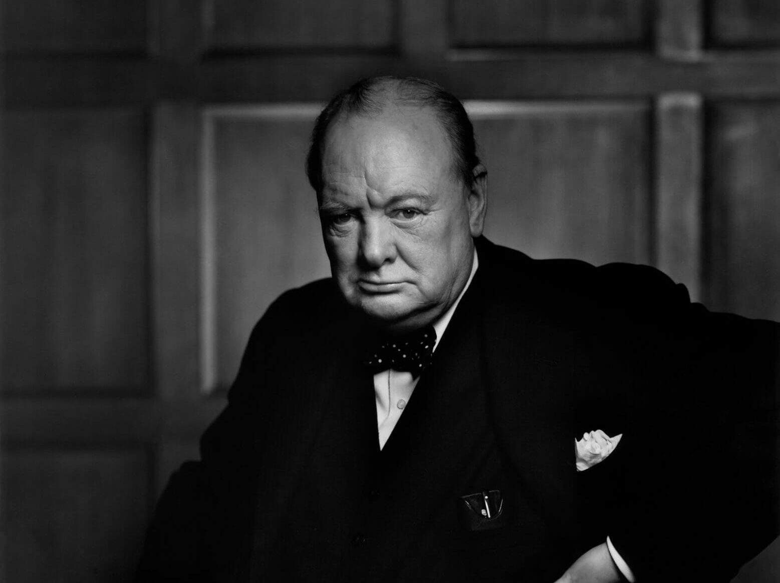 Winston Churchill wearing his signature polka dot bow tie in an iconic photograph by Yousuf Karsh