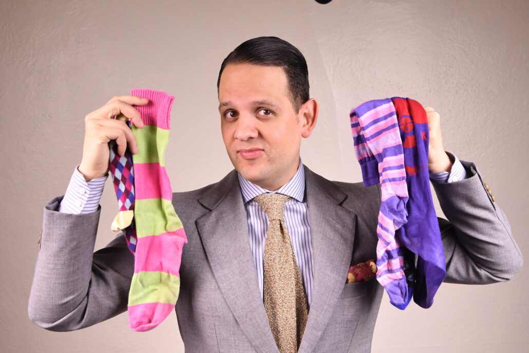 Raphael shows different fun socks in varied patterns