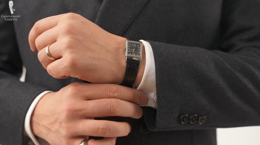 Raphael dons his vintage JLC Reverso watch (Pictured: Monkey Fist Knot Cufflinks - 925 Sterling Silver Platinum Plated from Fort Belvedere)