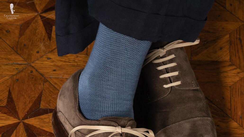 Two-toned solid socks has a subtle color effect for visual interest