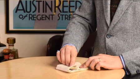The lower portion of a pocket square is folded inwards