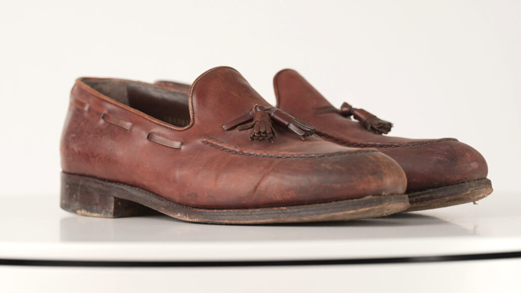 A pair of cordovan leather loafers that need  clean