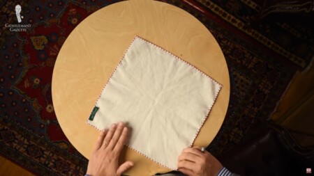 A pocket square flat on a table