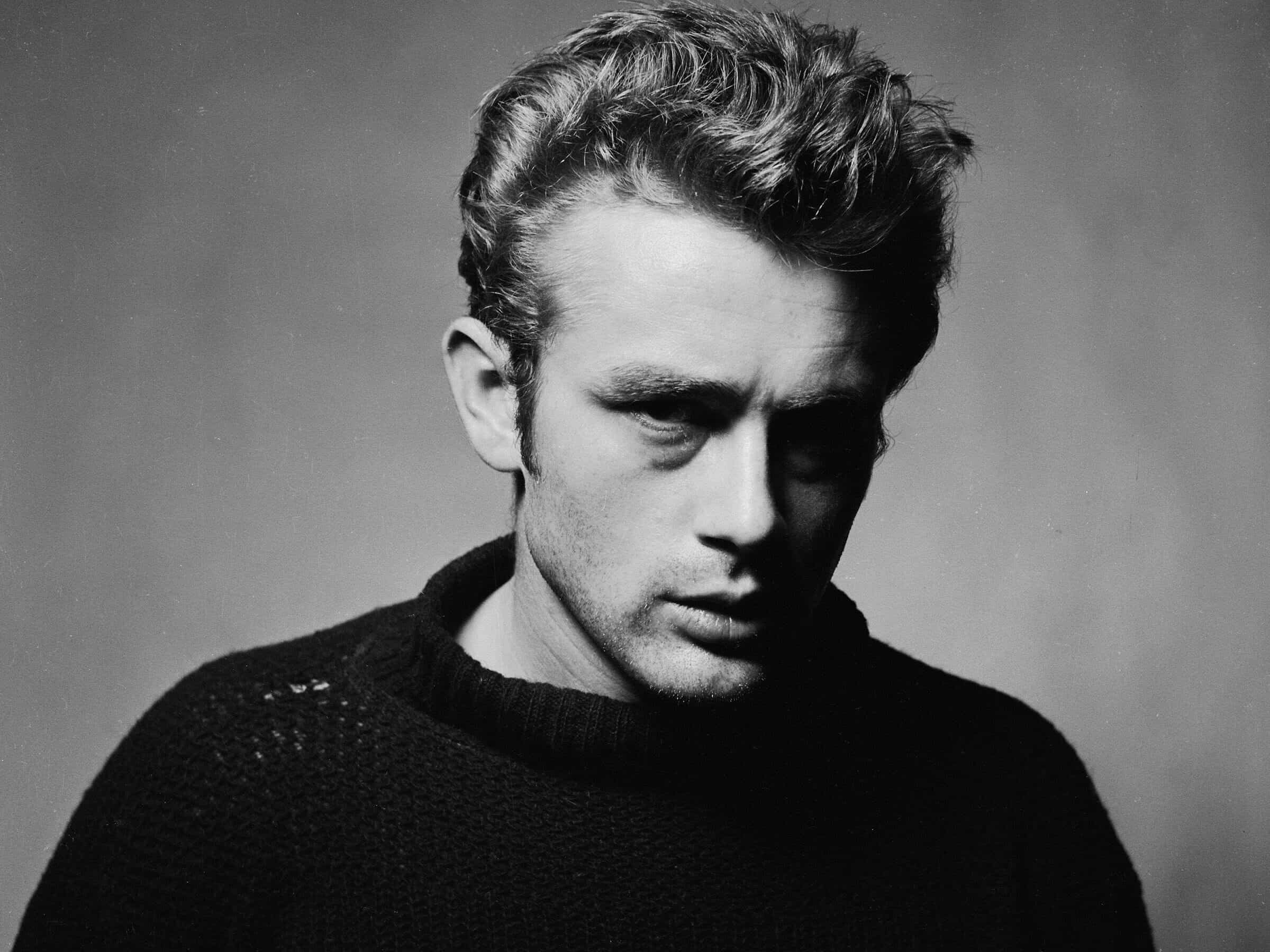 A moody Dean in a black turtleneck for the LIFE magazine photo shoot, "Torn Sweater."