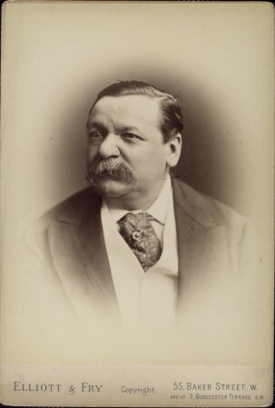 A black and white photograph of a man in 19th century clothing